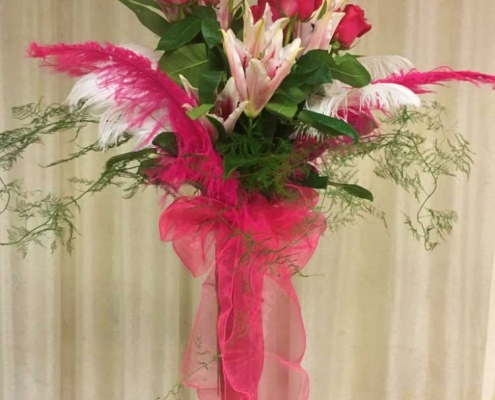 pink roses and orchid arrangement